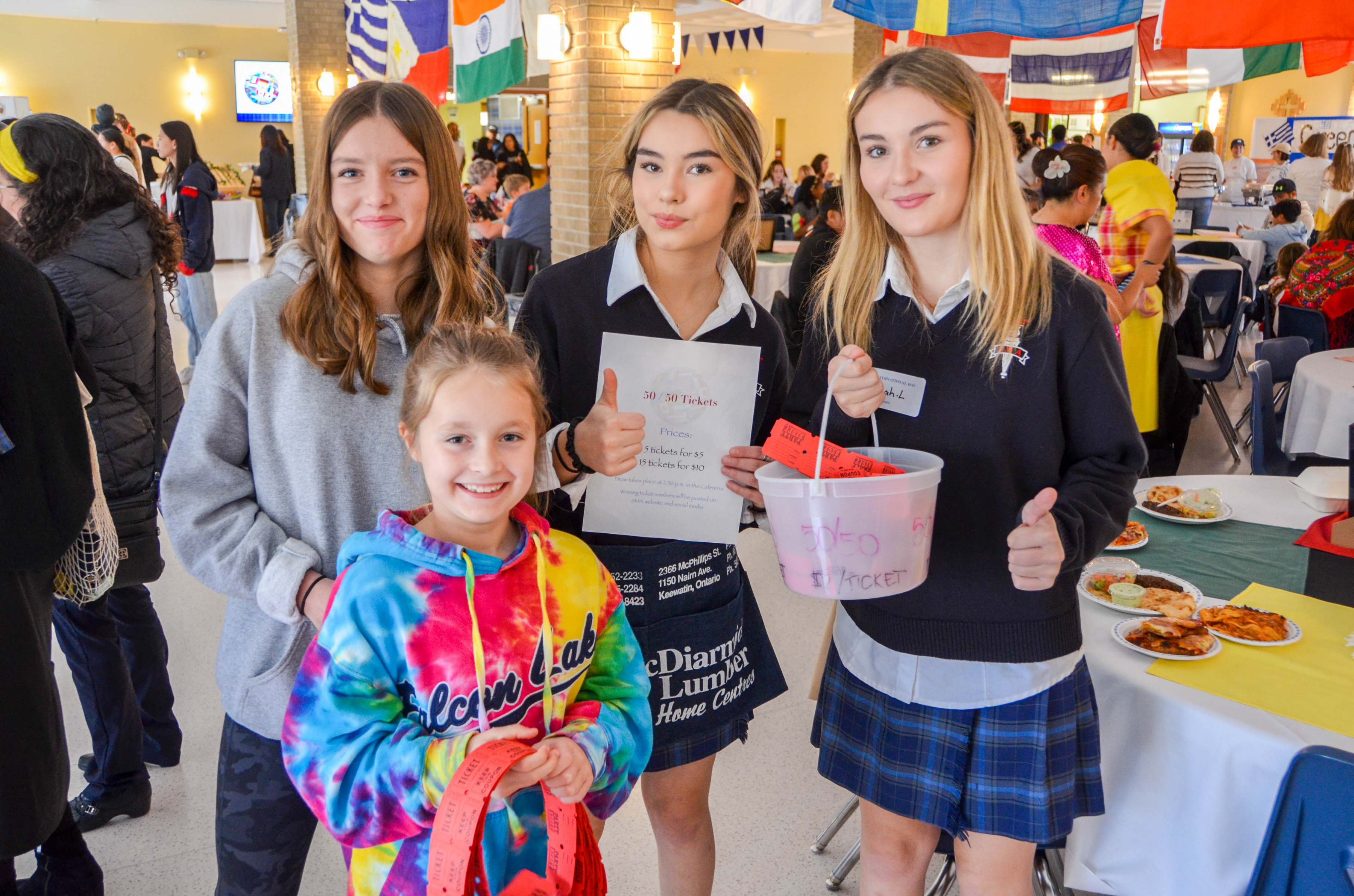 A group of four students at St. Mary's Academy International Day.